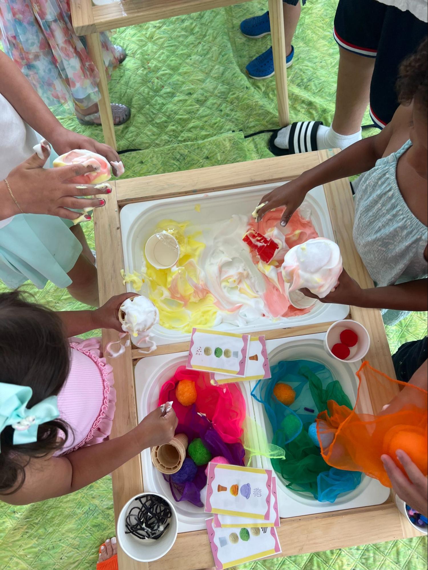 Overhead view of colorful sensory stations